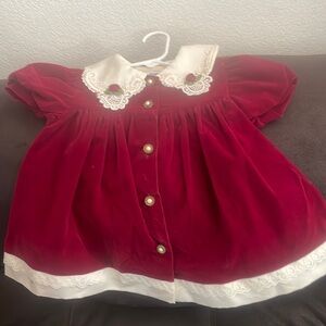Hi girl, brand 6 to 9 mo maroon & cream color dress.